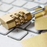 Golden padlock on a computer keyboard, illustrating secure MyDisney login recovery