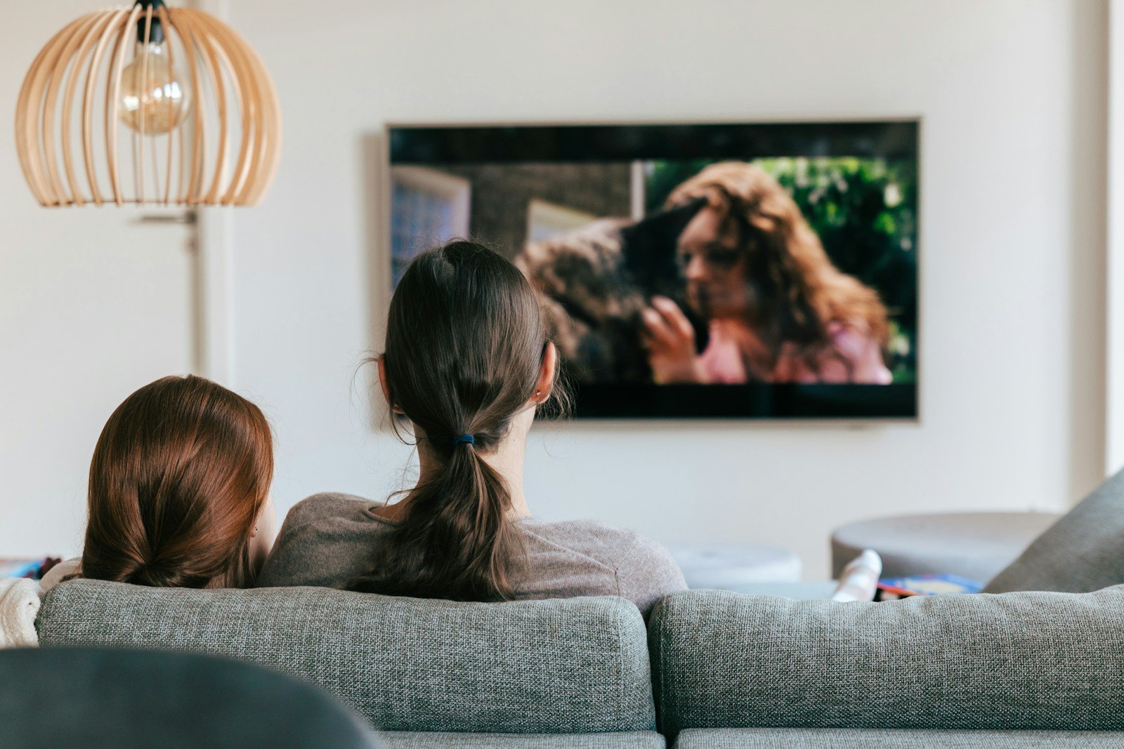 People watching television together at home