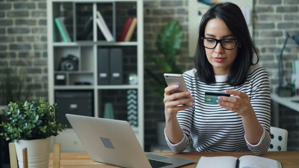 Phone and payment card for checking a streaming bill