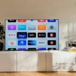 Smart television in a living room, illustrating Hulu device activation