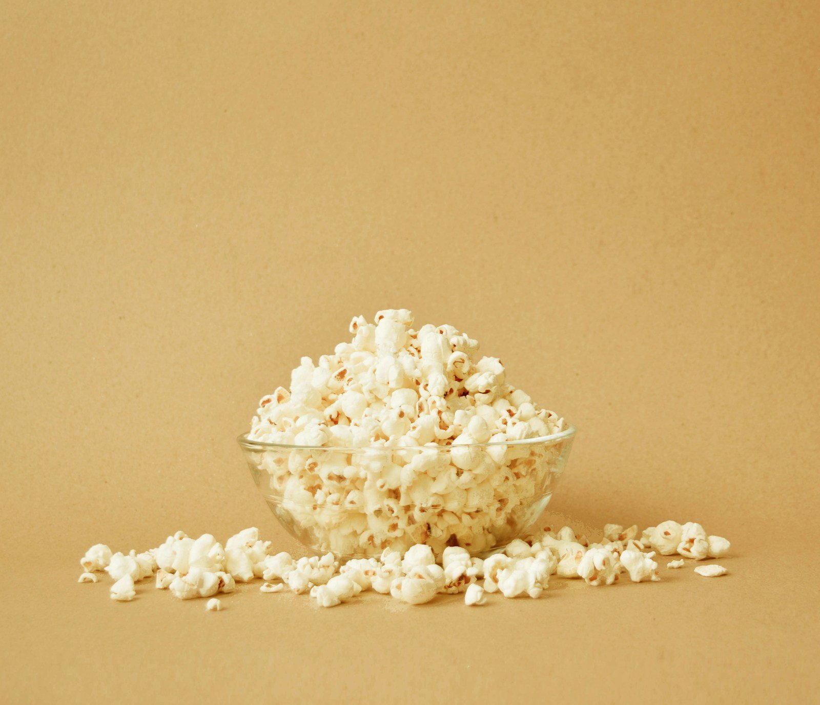Bowl of popcorn on a table for a movie night at home