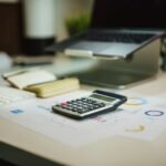 Calculator on a desk illustrating a streaming subscription budget