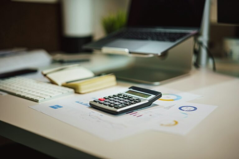 Calculator on a desk illustrating a streaming subscription budget