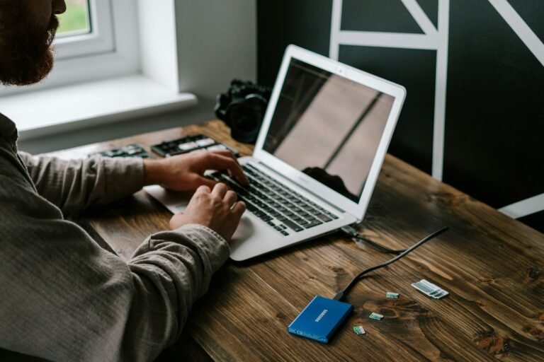 Person using a laptop to check account messages