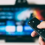Television screen illustrating how to fix subtitles and closed captions on streaming apps